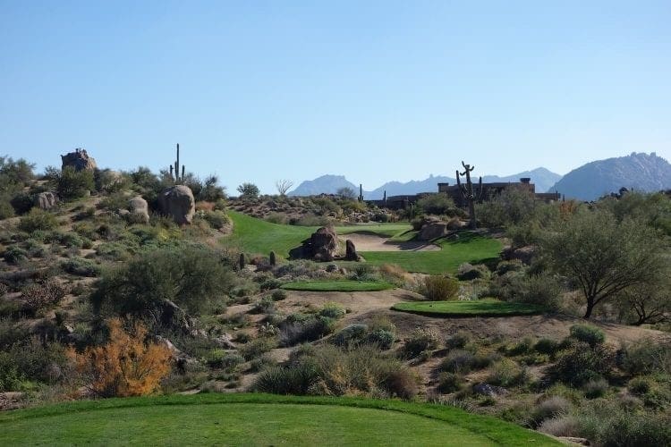 Navigate the wild beauty of Scottsdale's desert links: Saguaros guard the fairways at this championship track, perfect for golfers seeking authentic Arizona adventure.